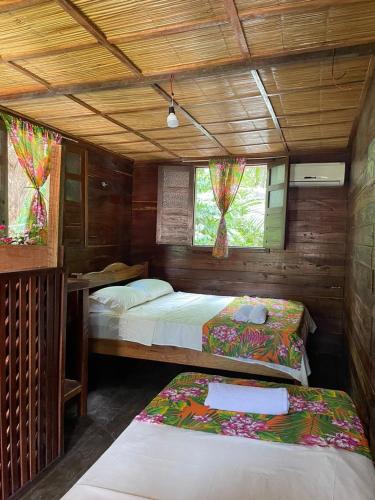 Katil atau katil-katil dalam bilik di Casa da Mata Marajó