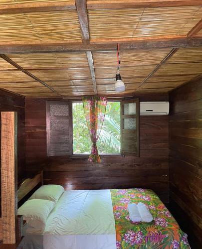 Katil atau katil-katil dalam bilik di Casa da Mata Marajó