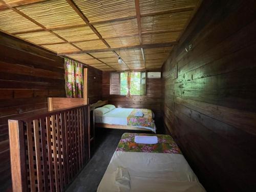 Katil atau katil-katil dalam bilik di Casa da Mata Marajó