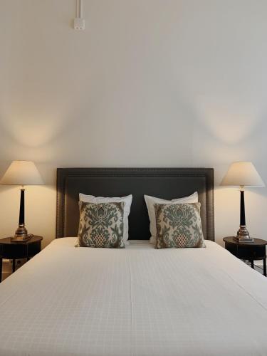 Ένα ή περισσότερα κρεβάτια σε δωμάτιο στο La Lys Rooms & Suites