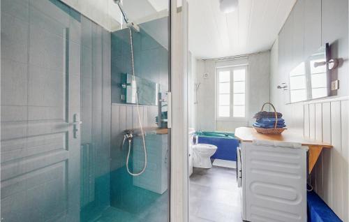 a bathroom with a shower and a sink and a toilet at 4 Bedroom Gorgeous Home In Jarnac in Jarnac