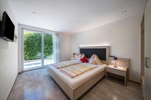 Postel nebo postele na pokoji v ubytování Weinreichhof Apartment Laaser Spitz