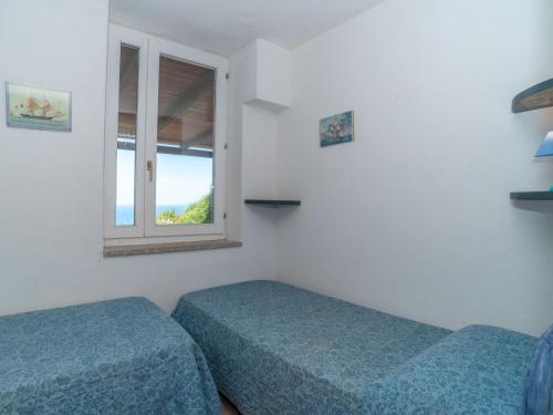 Katil atau katil-katil dalam bilik di Villa Scalitti by Interhome