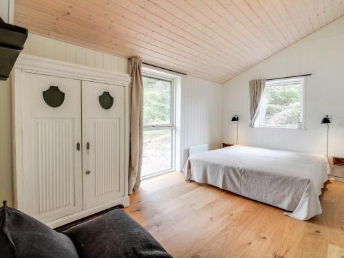 En eller flere senge i et værelse på Holiday Home Aleko - 2-5km from the sea in Western Jutland by Interhome