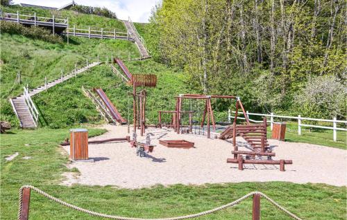 a park with a playground with a slide at Holiday Home Lemvig 12 in Lemvig