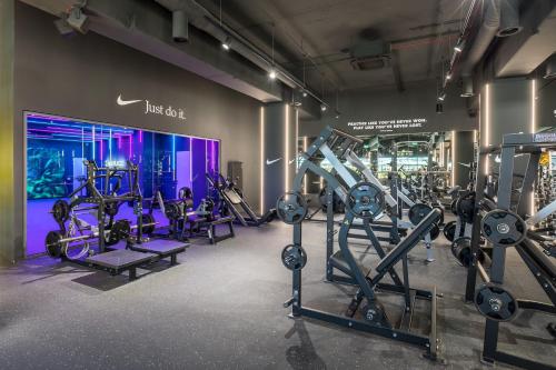 a gym with treadmills and cardio machines at Barceló Fortina Malta in Sliema