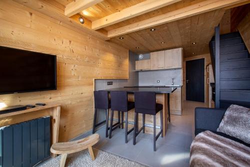 Val Thorens - Cosy Duplex avec Vue Silveralp 341にあるテレビまたはエンターテインメントセンター