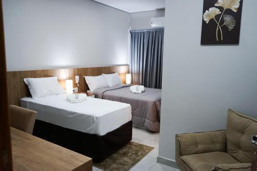 Hotel Lafayette tesisinde bir odada yatak veya yataklar