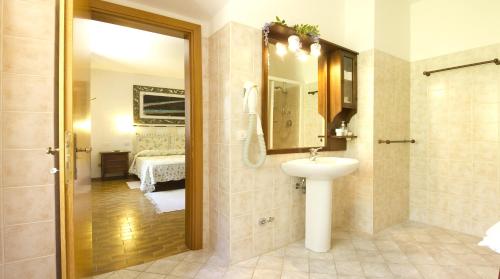 Koupelna v ubytování Agriturismo Casale Le Burgne
