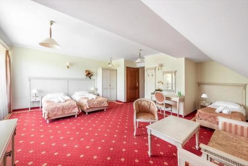 Hotel Stodółkaにあるベッド