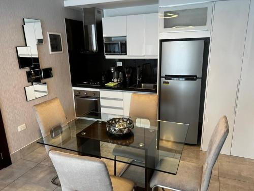 Η κουζίνα ή μικρή κουζίνα στο SOHA SUITES II