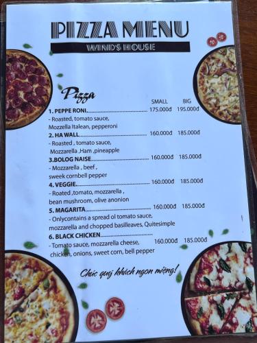a pizza menu with three pizzas on it at Wind's House Ha Giang in Ha Giang