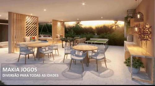 a rendering of a patio with tables and chairs at Makia Flat Muro Alto in Porto De Galinhas