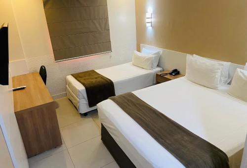 Hotel Thomasi Expressにあるベッド