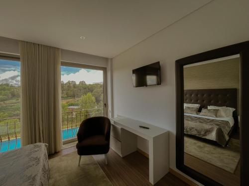 Ένα ή περισσότερα κρεβάτια σε δωμάτιο στο Quinta de VillaSete