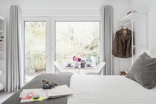 Postel nebo postele na pokoji v ubytování Siskin Guest Suite