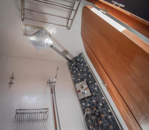 an overhead view of a staircase on a boat at The boathouse in Málaga