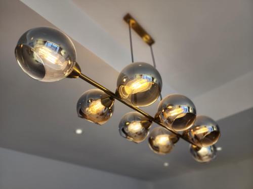 a chandelier hanging from a ceiling at Urban Suite - George Town in Jelutong