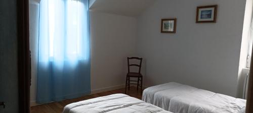 Ein Bett oder Betten in einem Zimmer der Unterkunft Chez Thythy