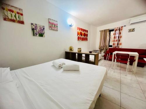 Ένα ή περισσότερα κρεβάτια σε δωμάτιο στο Suite Orizzonte - Sanremo