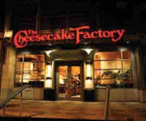 a restaurant with a sign that reads the unexpected factory at At Home by Mall of GA! in Buford