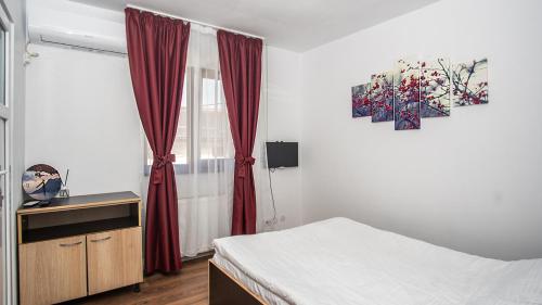 Postel nebo postele na pokoji v ubytování Hotel La Platouri