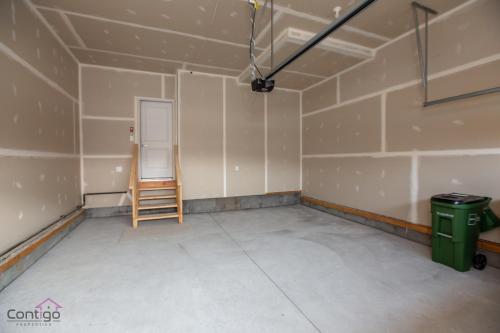 a room with a ladder and a chalkboard on the wall at Orchards Retreat, AC, Family Friendly, Sleeps 10, NearAirprt in Nisku