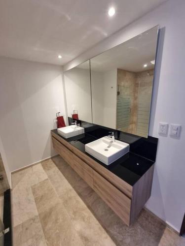 Ένα ή περισσότερα κρεβάτια σε δωμάτιο στο Hermoso apartamento por Andares con A/C