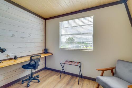 a room with a chair and a window at Hernando Beach Waterfront Home with Boat Dock and Deck in Hernando Beach