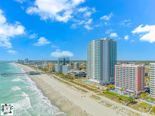 an aerial view of the beach and buildings at Spacious Oceanfront 2 Bedroom Suite - Sleeps 8! - Roxanne Towers Unit 406 in Myrtle Beach