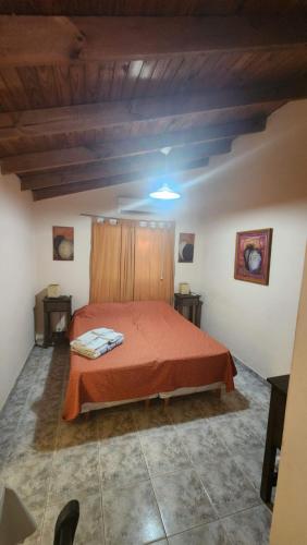 Postel nebo postele na pokoji v ubytování Cabañas Los Quijotes