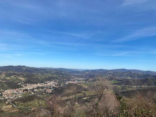 a view of a city from the top of a mountain at Lo Scoiattolo Country House in Montorio al Vomano
