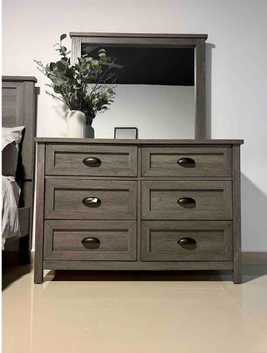a dresser with a mirror on top of it at North Breeze Guest House 1 in Levittown