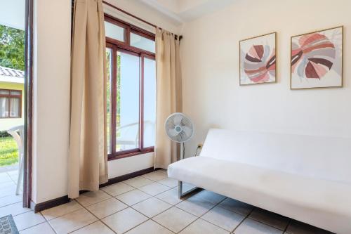 Postel nebo postele na pokoji v ubytování Hotel & Villas Tangerí