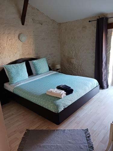 Postel nebo postele na pokoji v ubytování La Huppe