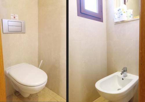 a bathroom with a toilet and a sink at Appartement Vizir 112 in Marrakesh