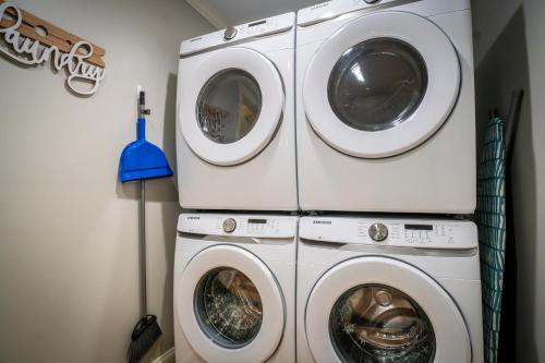 two washing machines and a washer and dryer in a room at Par-Tee Haus I- Game Room & Hot Tub-Walk to Helen in Helen