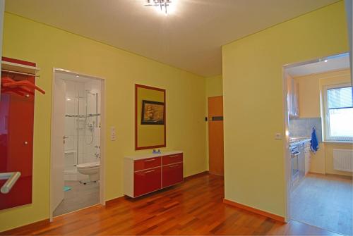 a bathroom with a shower and a sink and a toilet at Ferienwohnung AMBIENTE in Bremerhaven