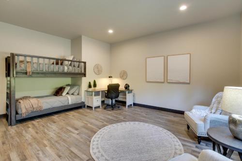 a bedroom with a bunk bed and a desk at South Dakota Retreat with Hot Tub, Fire Pit and Grill! in Spearfish
