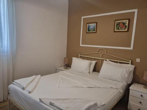 Postel nebo postele na pokoji v ubytování Corfu Glyfada Beach Apartments 67