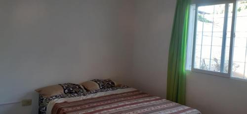Giường trong phòng chung tại CASA PARQUE CENTRAL