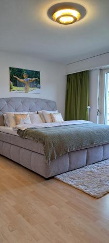 Postel nebo postele na pokoji v ubytování Grünes 1-Zimmer-Appartement