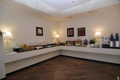 a waiting room with a counter in a store at Al Ponte Garnì in Pergine Valsugana