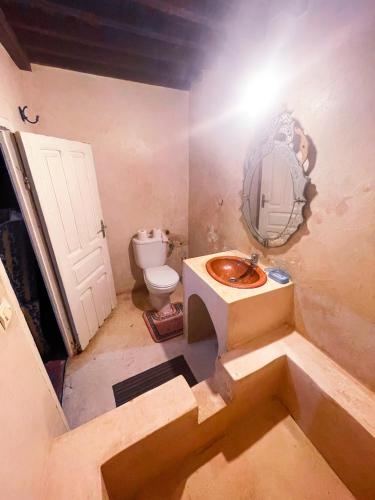 a bathroom with a sink and a toilet at La Maison Haute Larache Morocco in Larache