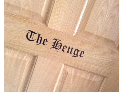 a wooden door with the bride written on it at B&B Dorwyn Manor in Avebury