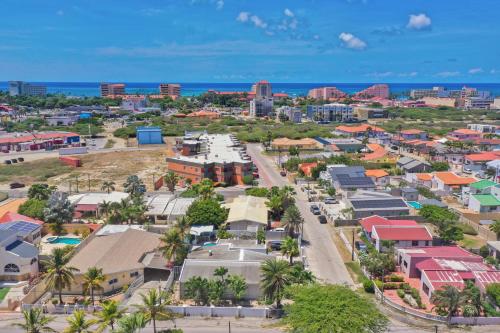 an aerial view of a city with buildings and the ocean at Private Luxury Villa Palm Beach in Palm-Eagle Beach