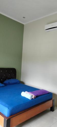 Postel nebo postele na pokoji v ubytování Panorama Seulako