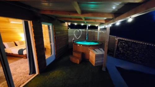 Fotografia z galérie ubytovania Chalet avec bain nordique v destinácii Durfort