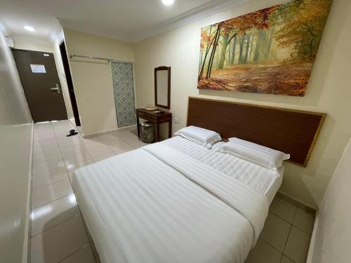 Postel nebo postele na pokoji v ubytování The Hotel