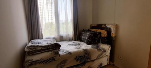 Vast! Metro Park Manhattan 2BR 객실 침대